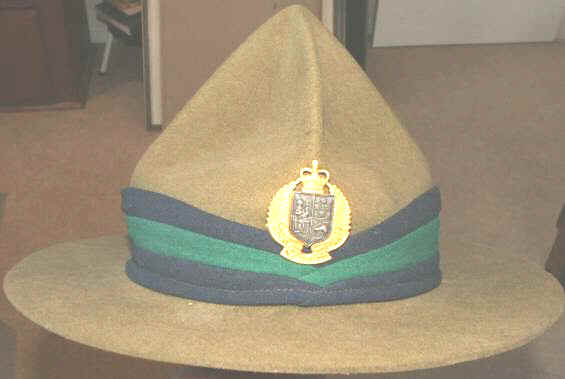  Royal New Zealand Dental Corps hat badge that is 100% original to cap.